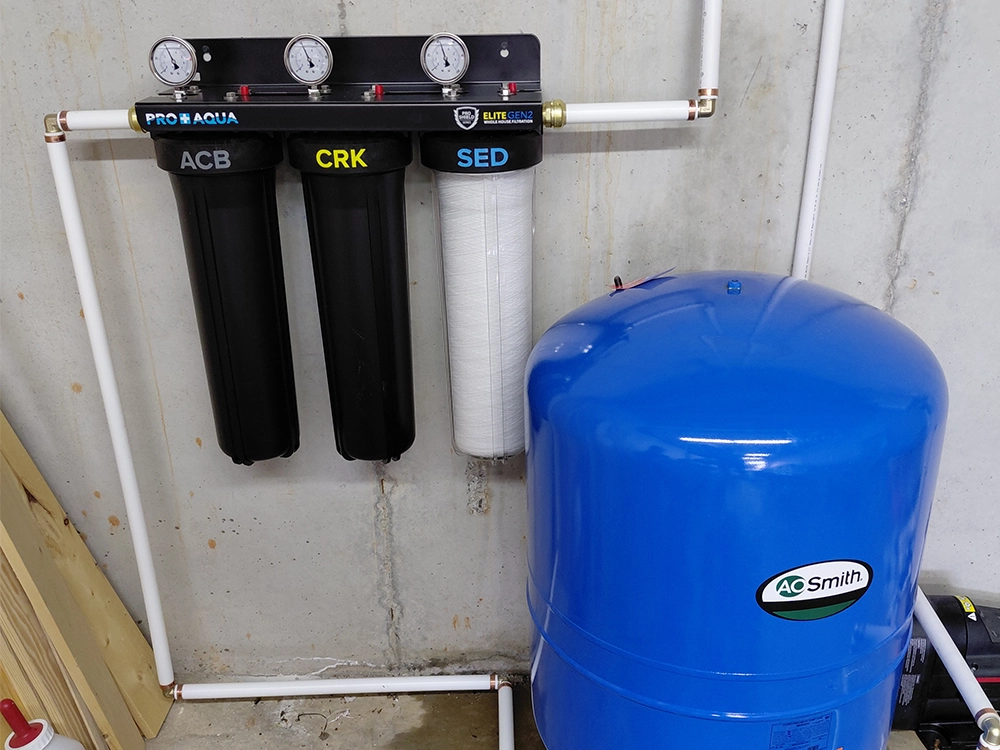 Water filtration system and expansion tank installed by Shedd's Plumbing in Cullman County, AL Water filtration system and expansion tank installed by Shedd's Plumbing in Cullman County, AL